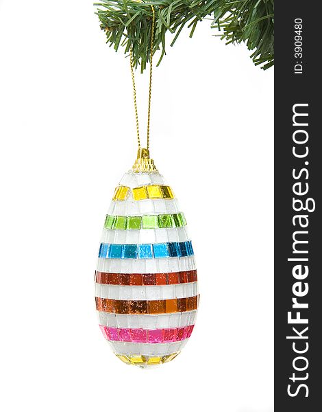 Ornament hanging on a christmas tree isolated against white background