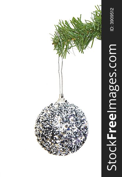 Grungy ornament hanging on a christmas tree