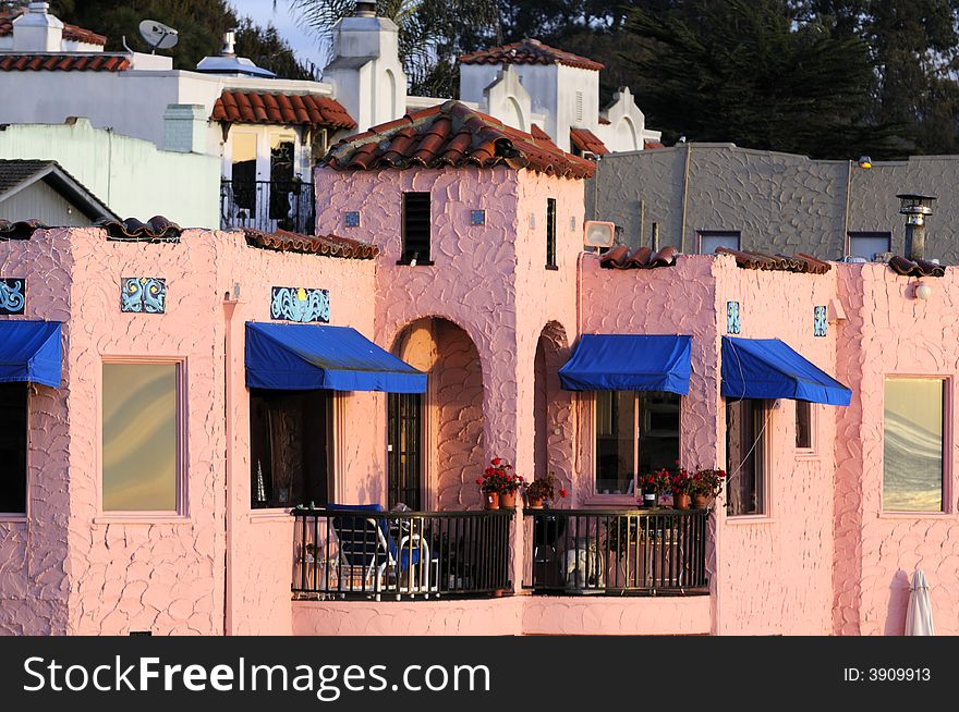 Colorful mediterranean home on the esplanade in Capitola, California in the early morning sunrise. Colorful mediterranean home on the esplanade in Capitola, California in the early morning sunrise