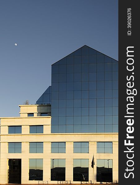 Office building with plate glass walls and gleaming steel and stone made structure in Piraeus ,Greece. Office building with plate glass walls and gleaming steel and stone made structure in Piraeus ,Greece