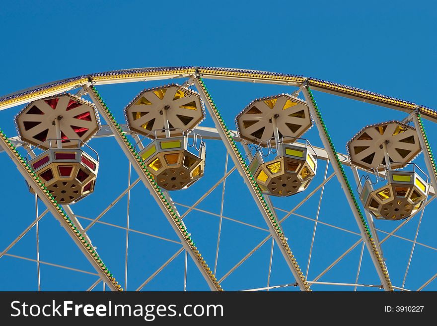 Ferris Wheel against blue sky (detail). Ferris Wheel against blue sky (detail)