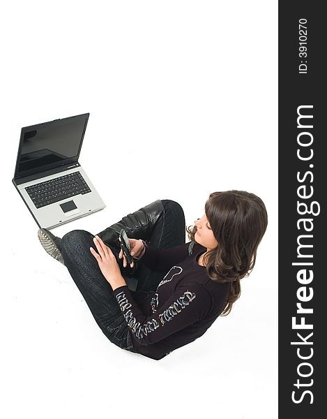 Young brunette girl in black with lap top computer representing modern communications. Young brunette girl in black with lap top computer representing modern communications.