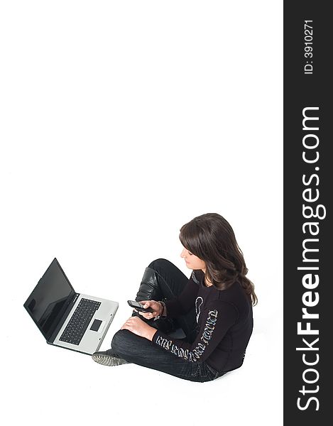 Young brunette girl in black with lap top computer representing modern communications. Young brunette girl in black with lap top computer representing modern communications.