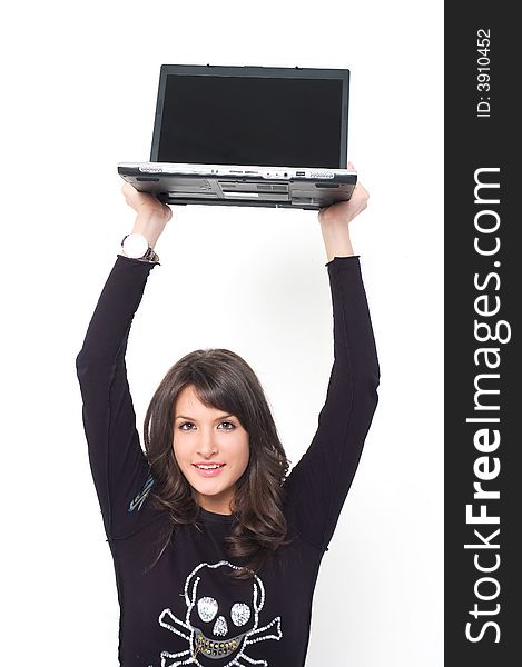 Young brunette girl in black with lap top computer representing modern communications. Young brunette girl in black with lap top computer representing modern communications.