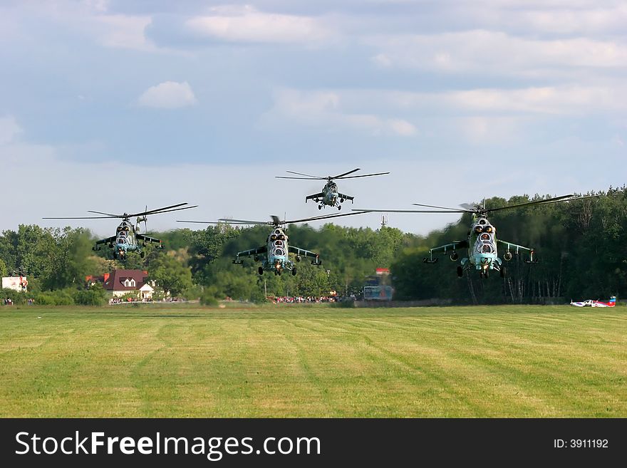 Five military helicopters flying during air show. Five military helicopters flying during air show