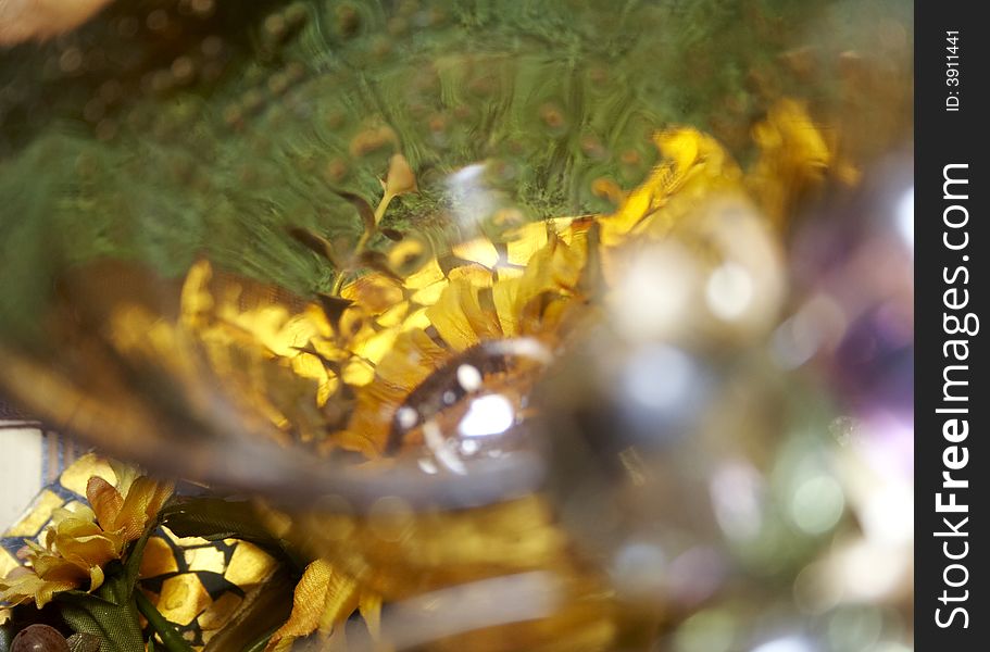 Close-up of yellow wineglass for background use