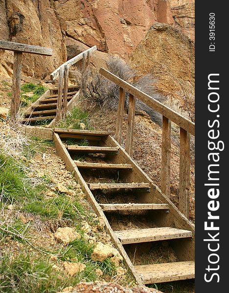 Two sets of stairs against a cliff. Two sets of stairs against a cliff