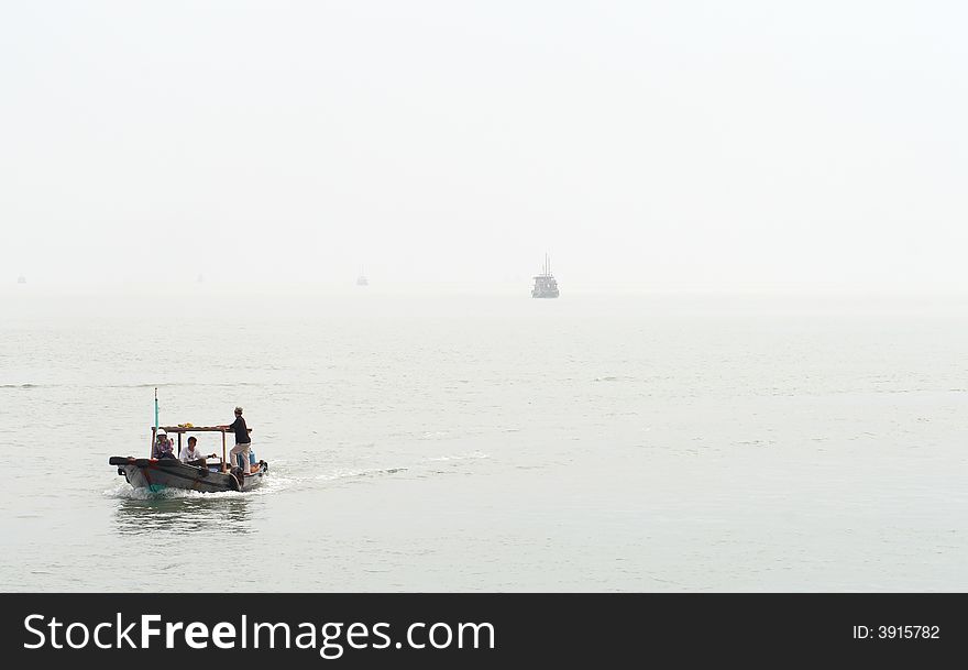 Some boats in the fog - vietnam