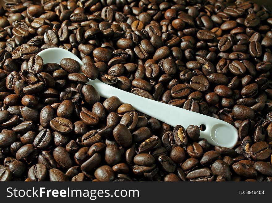 Coffee Beans and white spoon