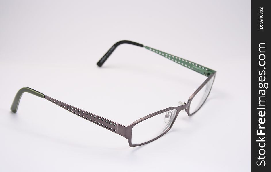 Green, dark-gray glasses isolated on white background. Green, dark-gray glasses isolated on white background