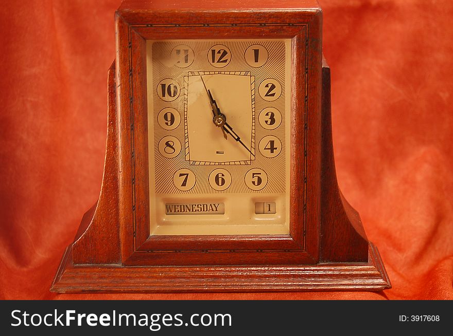 Photo of an old nice looking clock. Photo of an old nice looking clock.