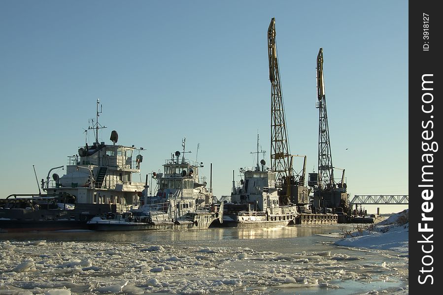 Ships in ices on the river in winter. Ships in ices on the river in winter