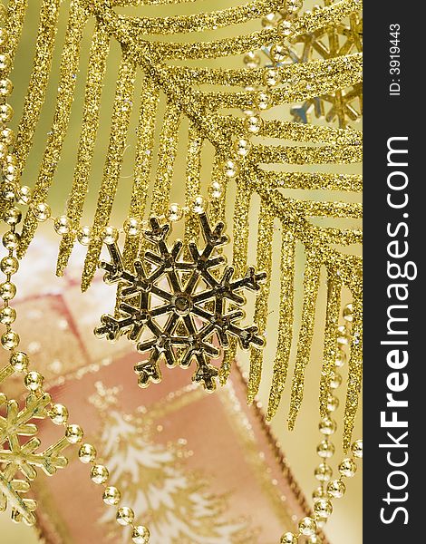 Golden snowflake on Christmas tree