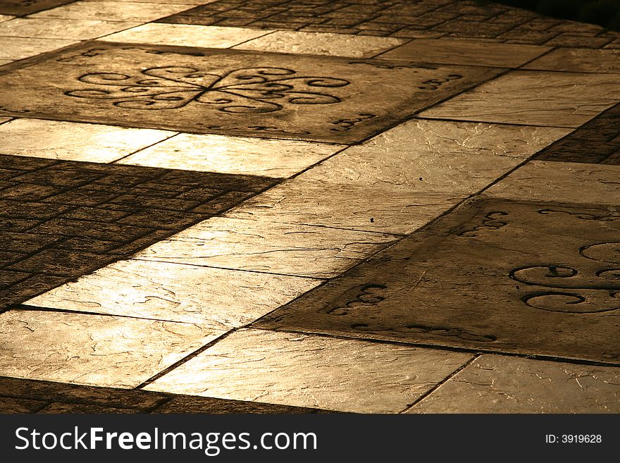 Tiled Pavement Background at sunset