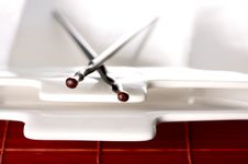 Wooden Chopsticks & White Plate Stock Images Wooden Chopsticks & White Plate Stock Images