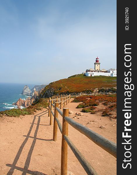Cabo de rocka in Portugal with lighthouse at the edge of a rocky cliff and ocean. Cabo de rocka in Portugal with lighthouse at the edge of a rocky cliff and ocean