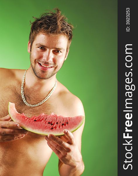 Undressed man with a watermelon