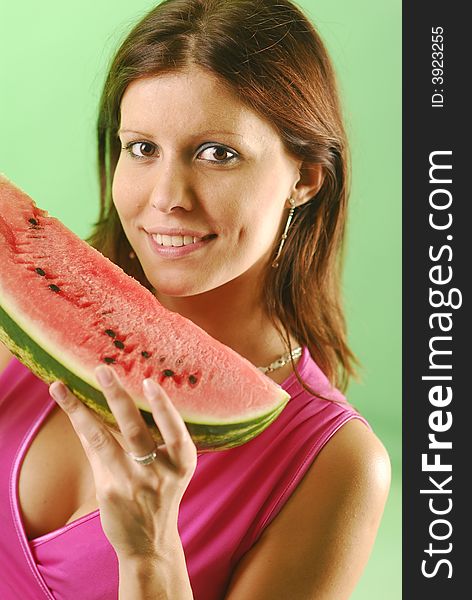 Pretty woman with a watermelon