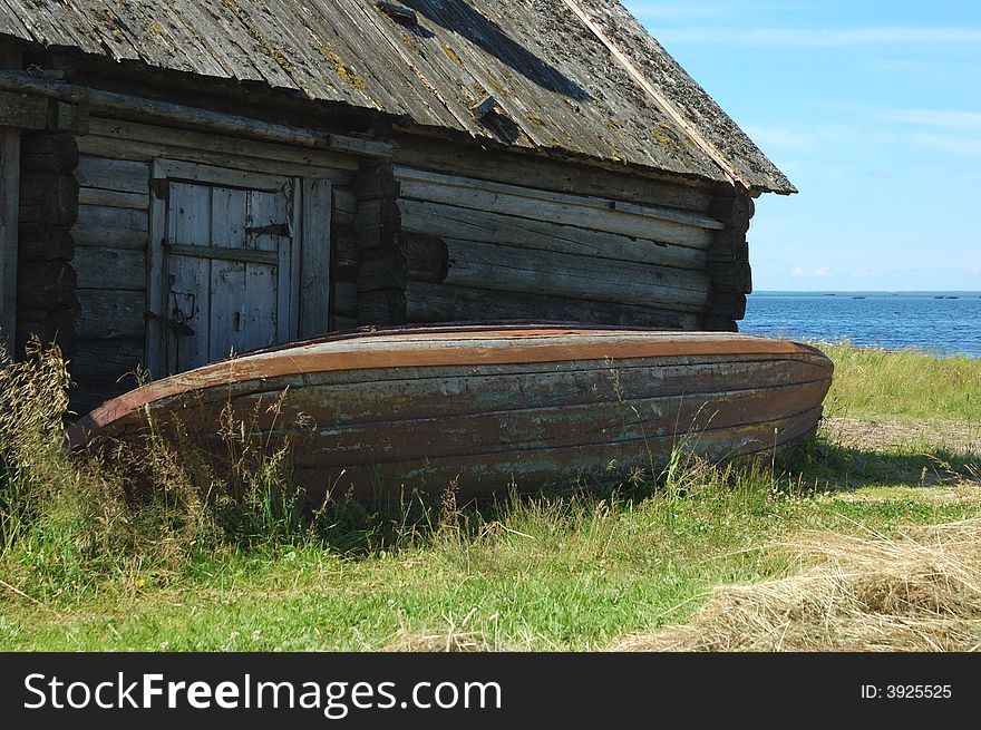 Old fishing boat near the shed