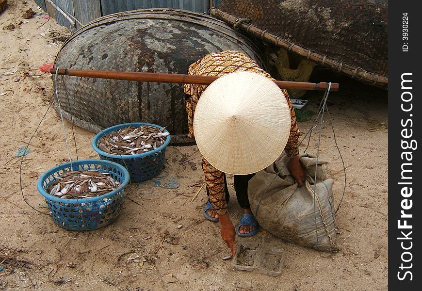 Woman from the fishermen village - Vietnam.