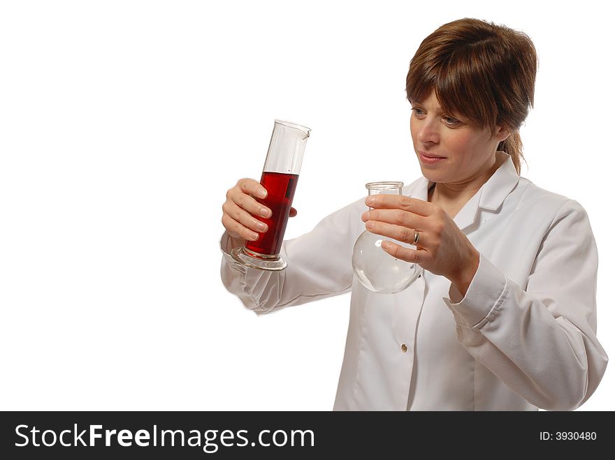 Cute young lady scientist in white coat, holding flask and red liquid, isolated on white