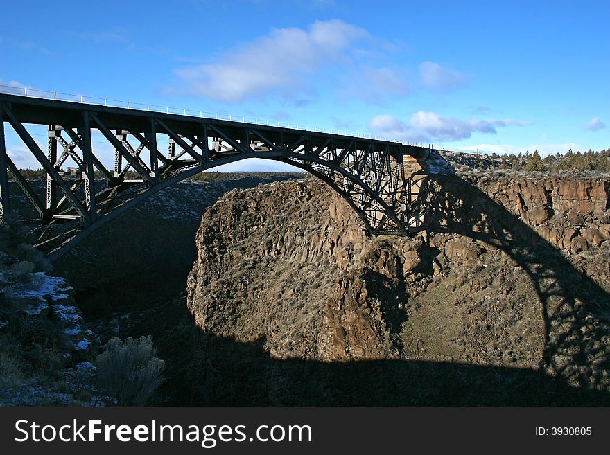 A railroad bridge across a deep canyon in oregon