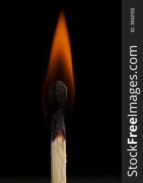 Close up macro of a match on fire. Close up macro of a match on fire