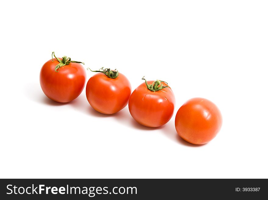Tomatoes on isolated white background
