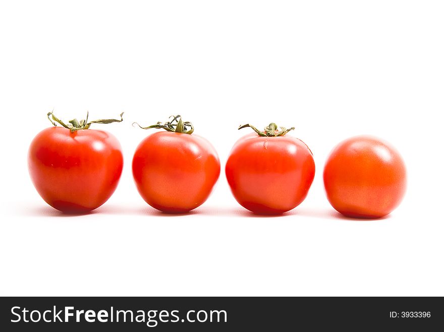 Tomatoes on isolated white background