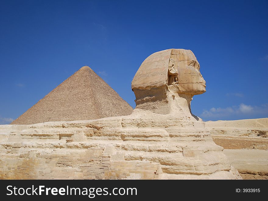 Sphinx and Pyramid of pharaoh Cheops. Giza in Egypt.