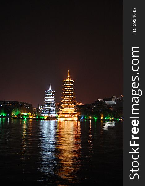 2 pagoda's in city of Guiling by night. 2 pagoda's in city of Guiling by night