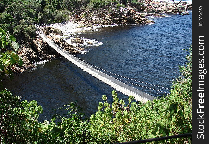Suspension bridge crossing over the mouth of the Storms River