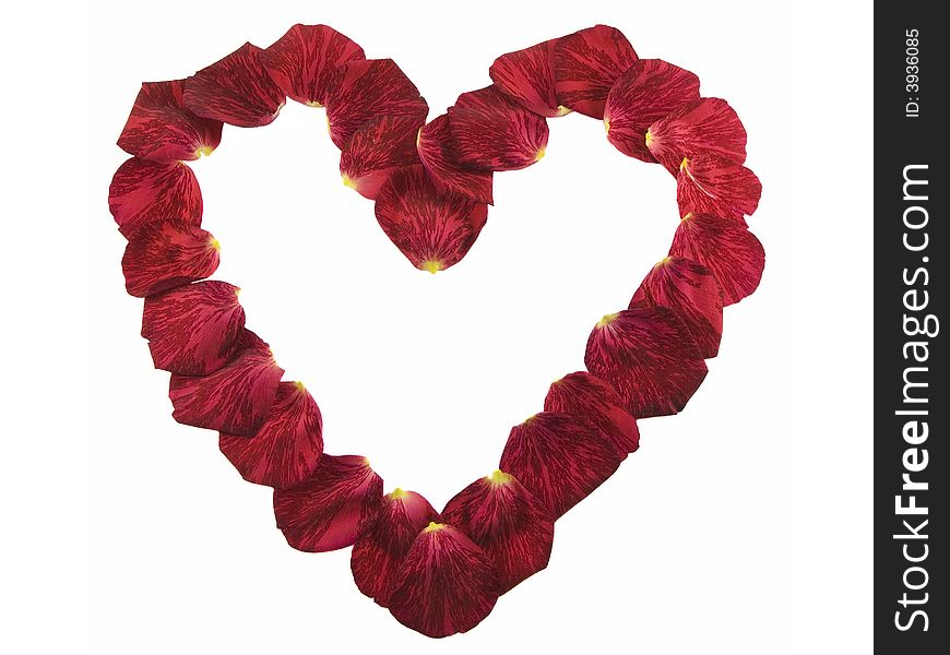 Heart shape made of red rose petals isolated on white. Heart shape made of red rose petals isolated on white