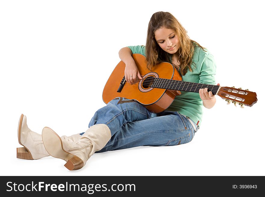 Young girl with guitar. Isolate on white.