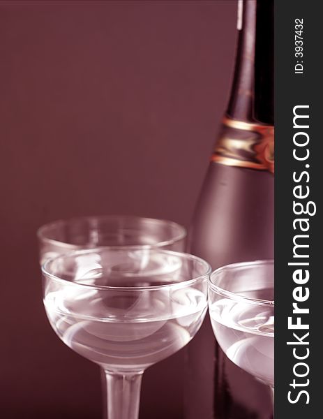 Image from christmas series: bottle and goblets on champagne