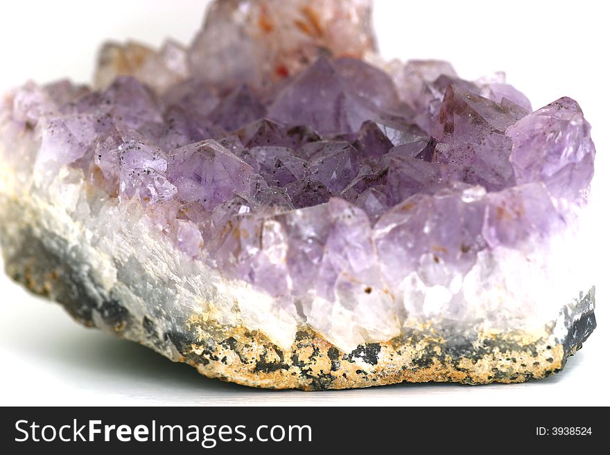 Purple and white crystal, isolated. Purple and white crystal, isolated