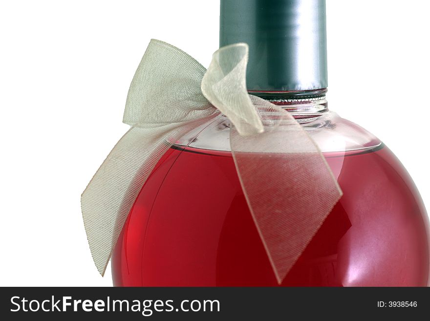 Red cosmetic in a flask with ribbon. Red cosmetic in a flask with ribbon