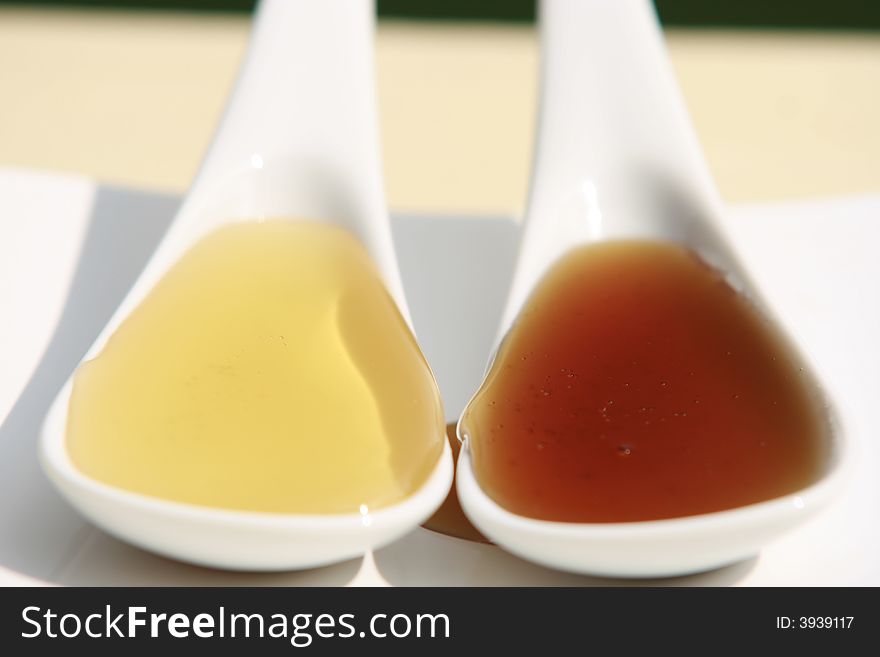 Two sorts of honey in a spoon