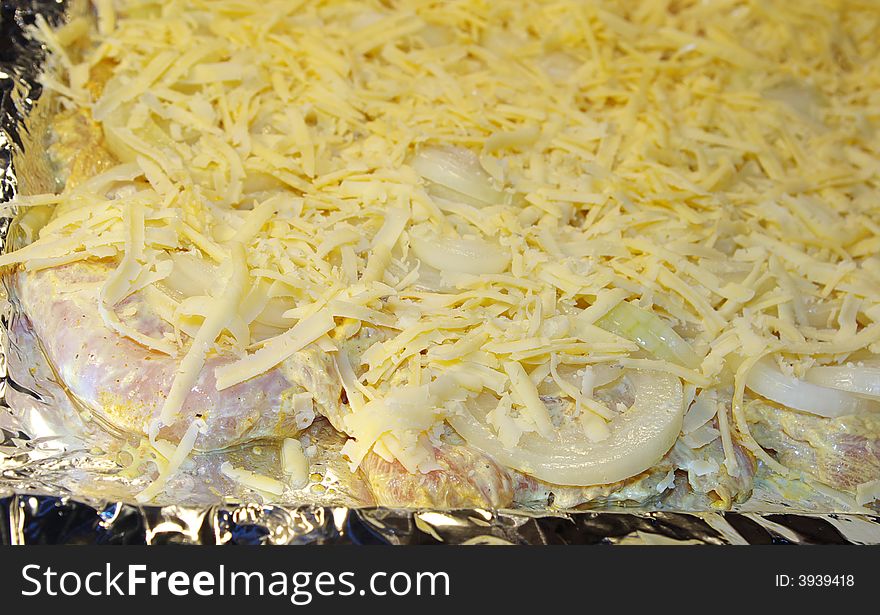 Raw meat with onions and cheese. Raw meat with onions and cheese