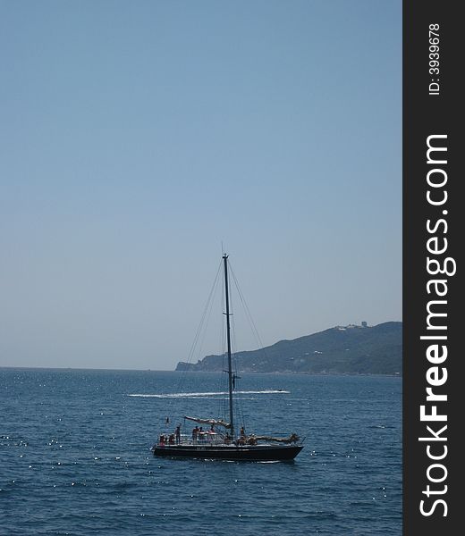 Sailing boat floating on a sea