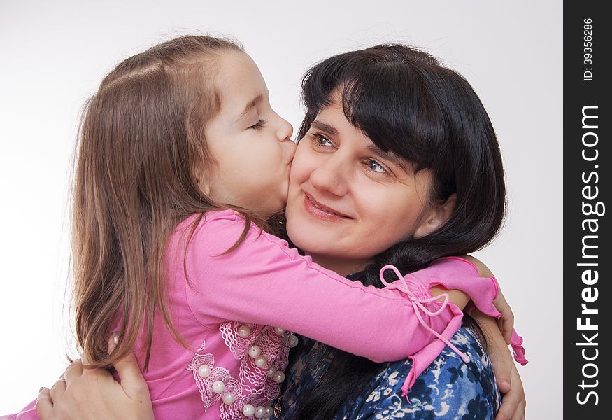 Girl Kissing Her Mother