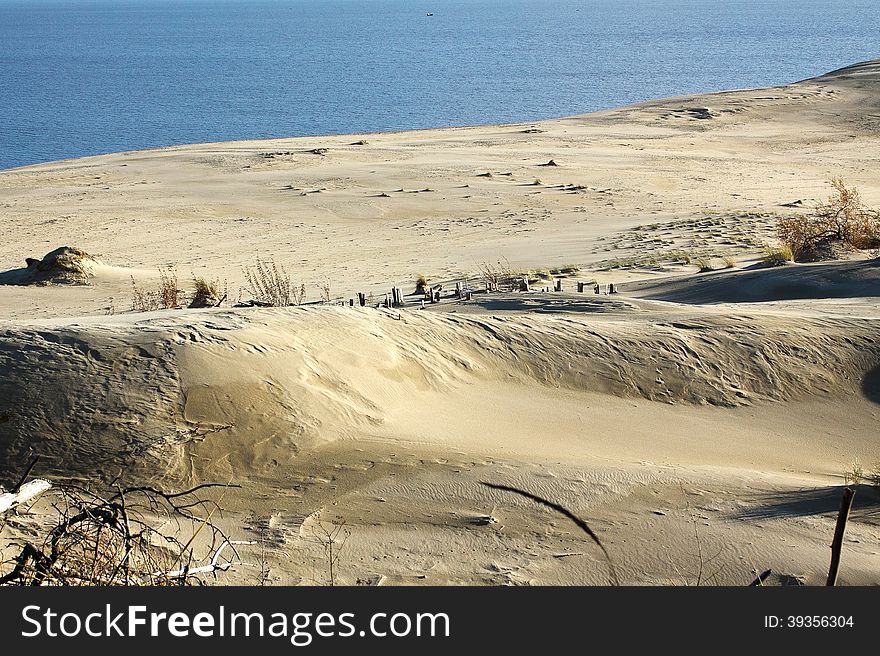 Sand dune at the seaside on sunny summer day