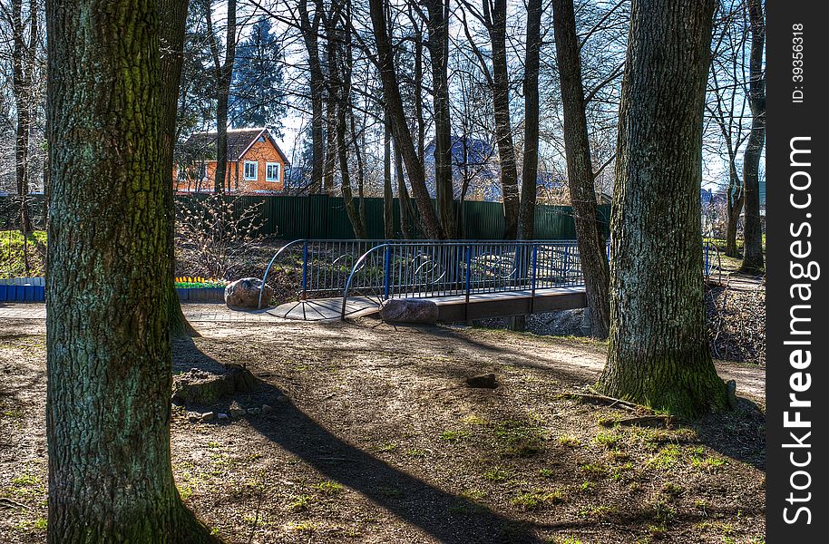 Bridge over a stream in the wood near the house