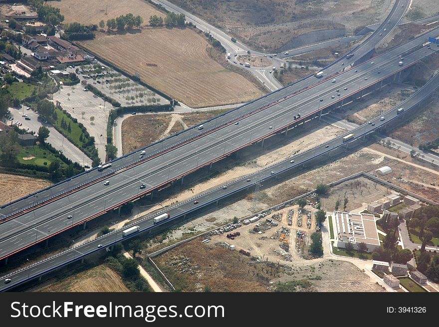 A landscape with a motorway from the plane. A landscape with a motorway from the plane