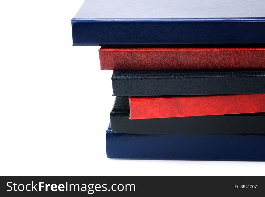 Stack of books isolated on white with copy space