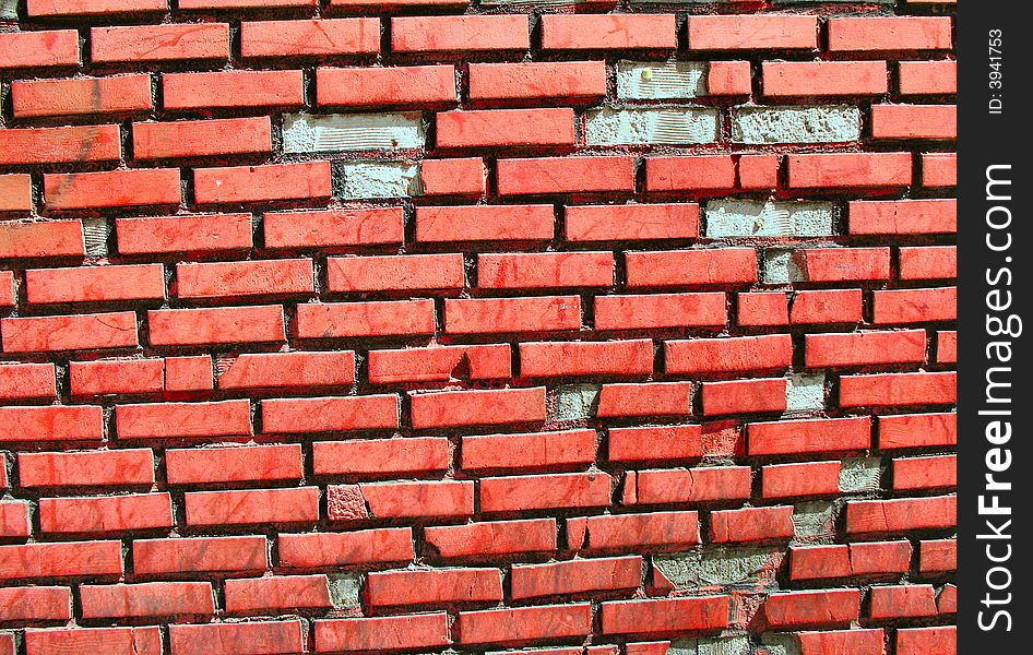 Red Brick wall, with a few missing bricks. Red Brick wall, with a few missing bricks