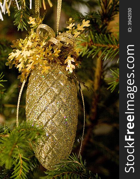 Golden New-Year tree decoration very close-up