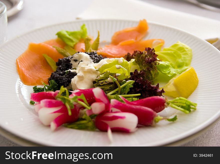 Plate with Salmon and salad. Plate with Salmon and salad