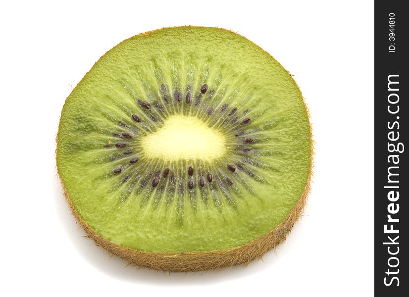Slice of kiwi on white background