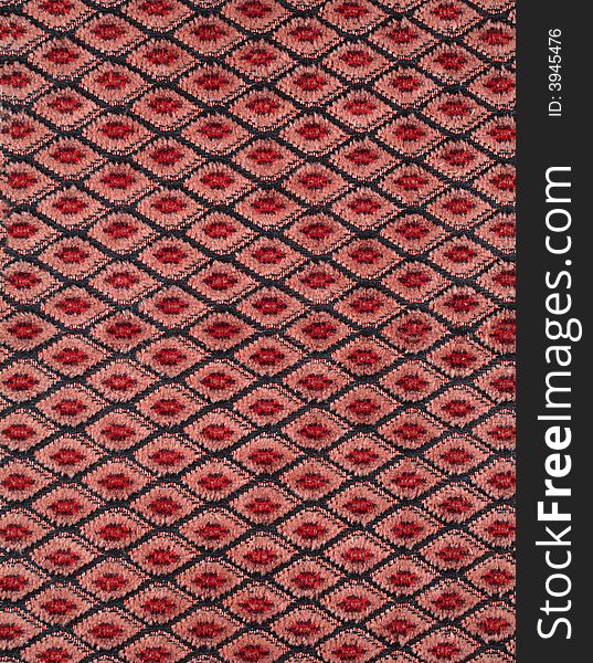 Red fabric material texture with rhombs. Red fabric material texture with rhombs